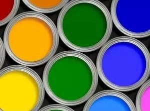 a group of cans of paint