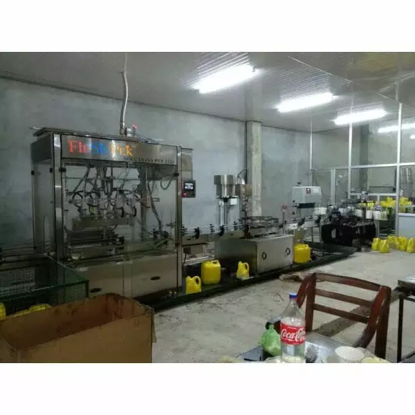 Automatic Musterd Oil Tin Filling Machine 3 Automatic Musterd Oil Tin Filling Machine